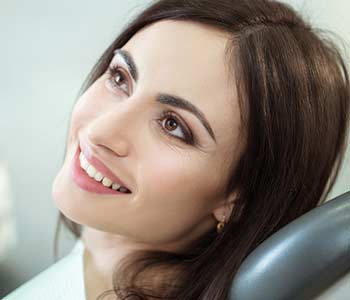 Lady patient sitting on the dentist chair