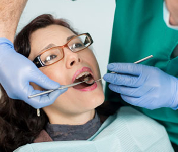 Close up of woman having dental check up in dental office
